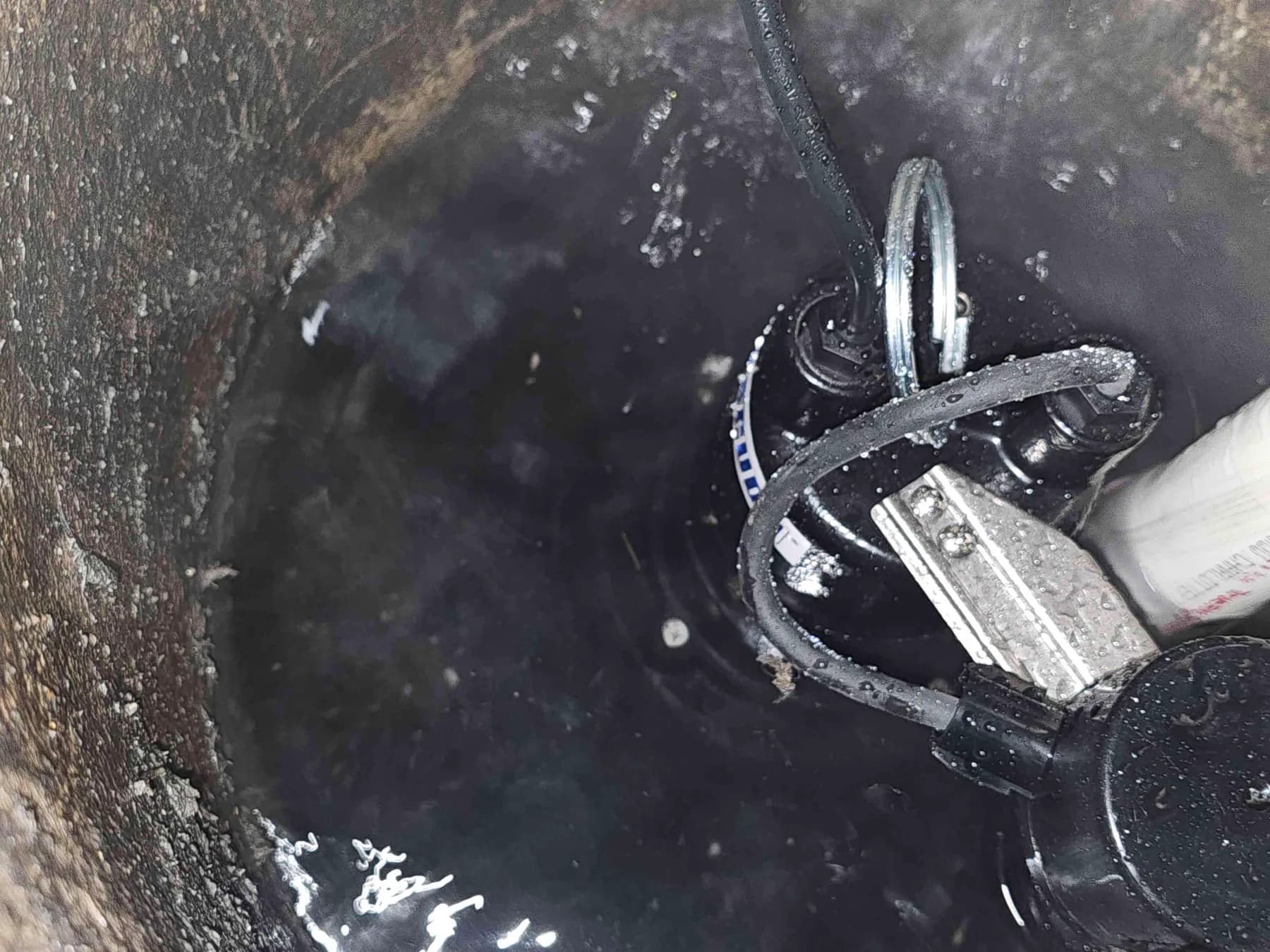 Replacement sump pump positioned inside the basin
